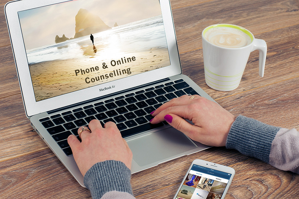 woman on laptop online counselling & coaching